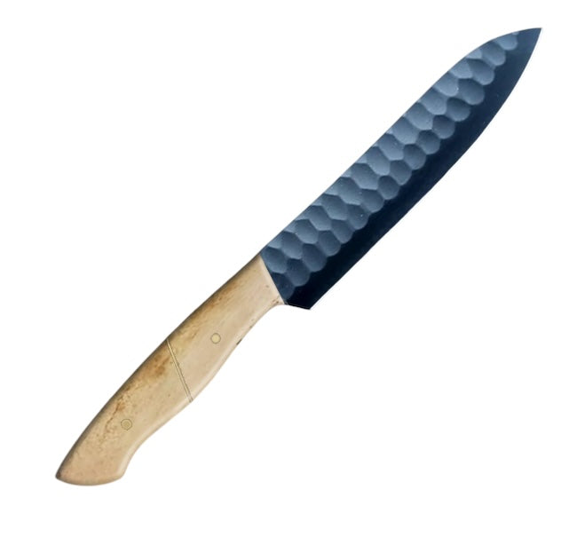 12.4-inch full-tang santoku knife with a carbon-coated blade and a polished beige camel bone handle, designed for precision, durability, and versatility in kitchen tasks like chopping, slicing, and dicing.